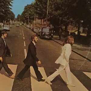 Beatles Abbey Road album.  Some fingerprints a scratches but none severe.